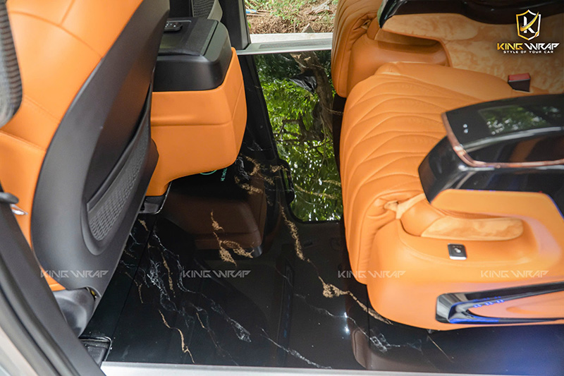 Độ sàn đá xe kia Carnival